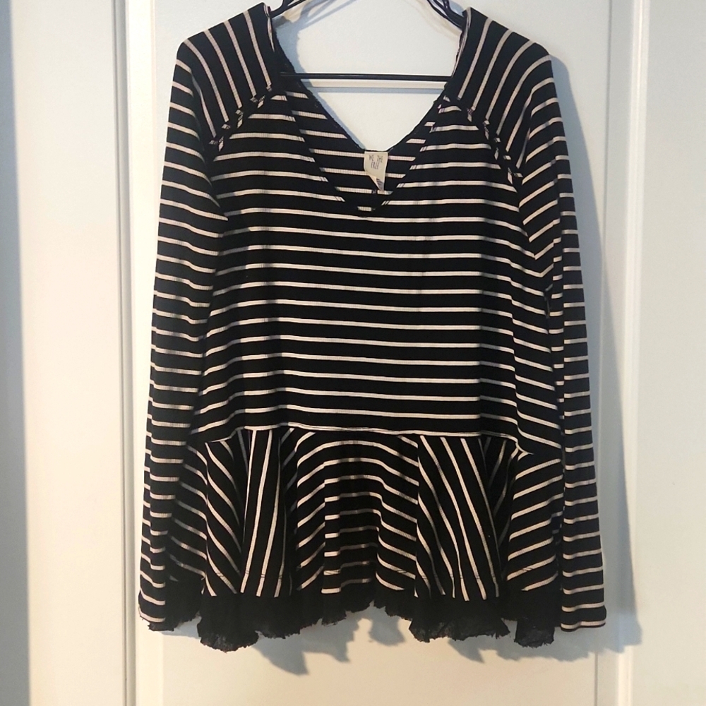 We The Free knit long sleeve. Black and white. Small. Lace on bottom. Distressed